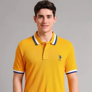 U.S. Polo ASSN. Solid Slim Fit Polo T-Shirt for Men made from 100% cotton with half sleeves, soft breathable fabric, classic polo collar, comfortable casual wear for men.